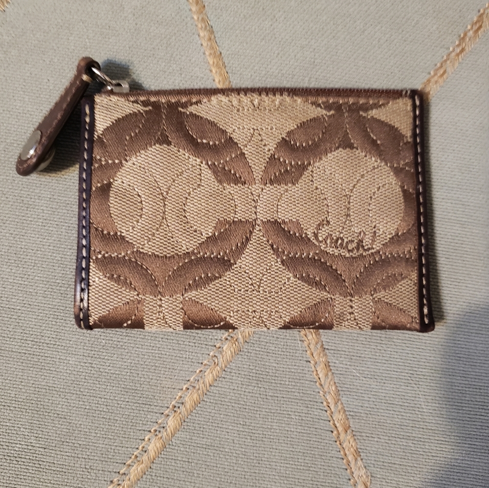 Coach change holder